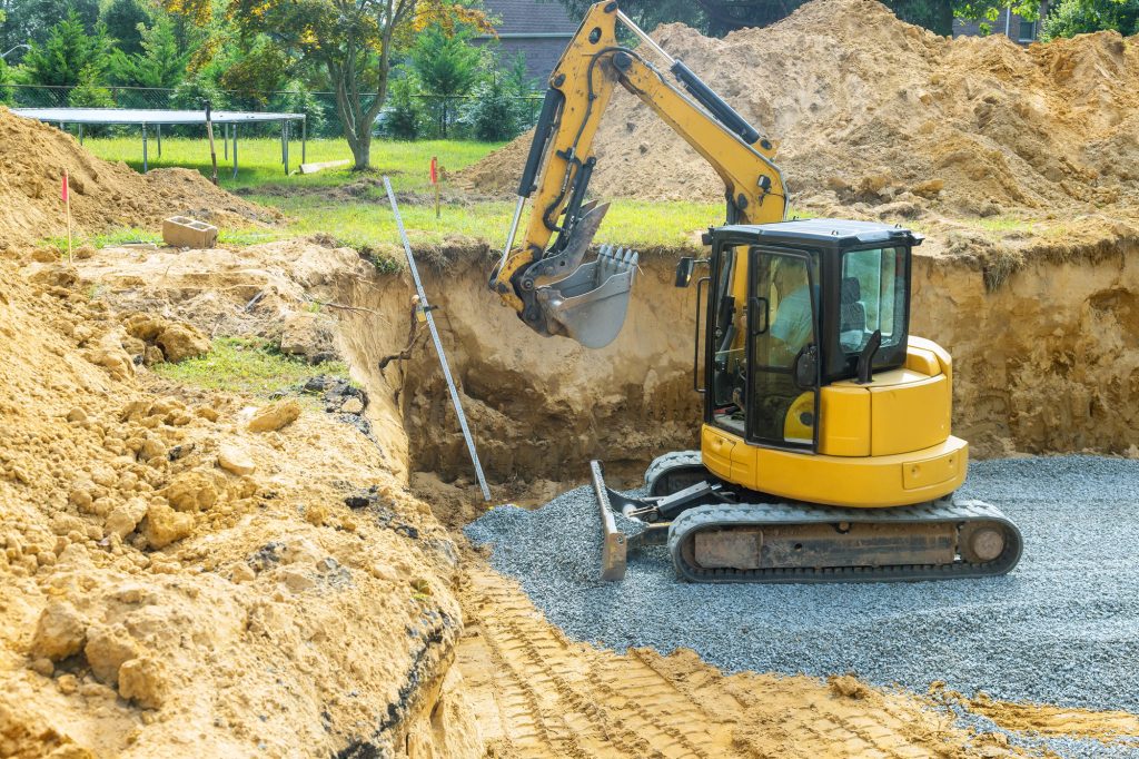 Expert Excavation and Septic Services in Greater Rutland Excavators fill irregularities in excavations with granite rubble bases, which are used to form