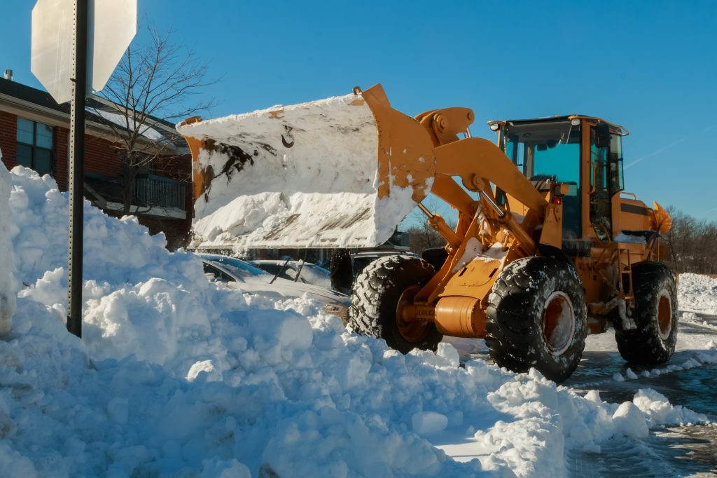 Expert Excavation and Septic Services in Greater Rutland Snow removal vehicle removing snow snow tractor snow removal